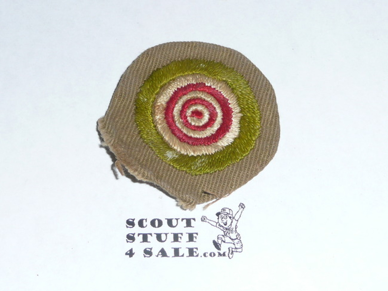 Marksmanship - Type B - Wide Crimped Bdr Tan Merit Badge (1934-1935), Used