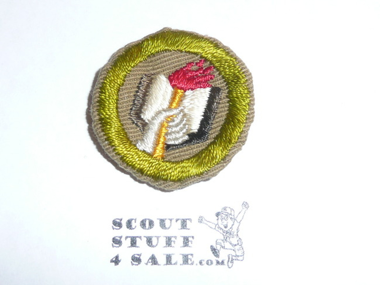 Scholarship - Type A - Square Tan Merit Badge (1911-1933), Material folded under with some trimming