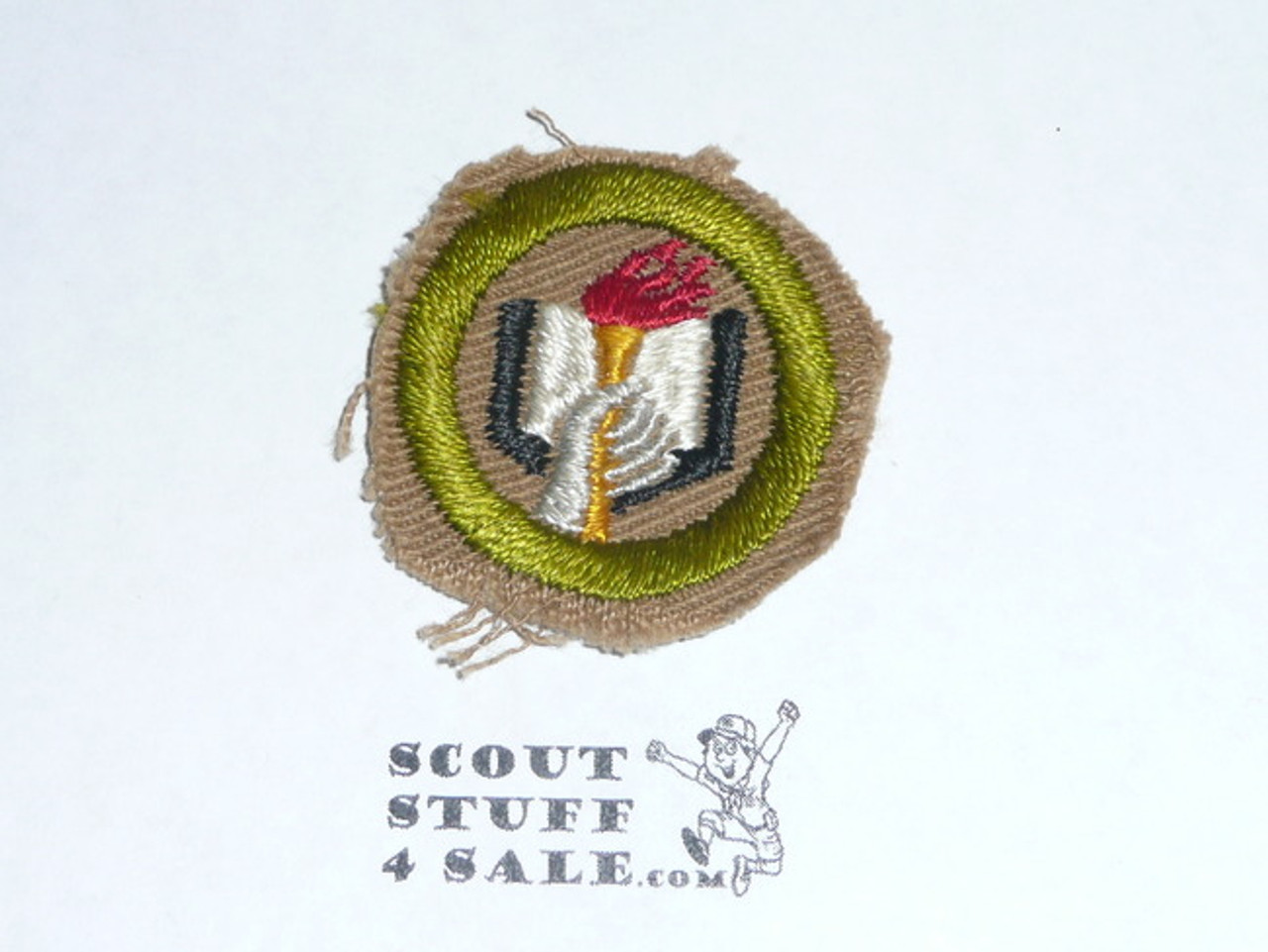 Scholarship - Type A - Square Tan Merit Badge (1911-1933), cut to round or little material