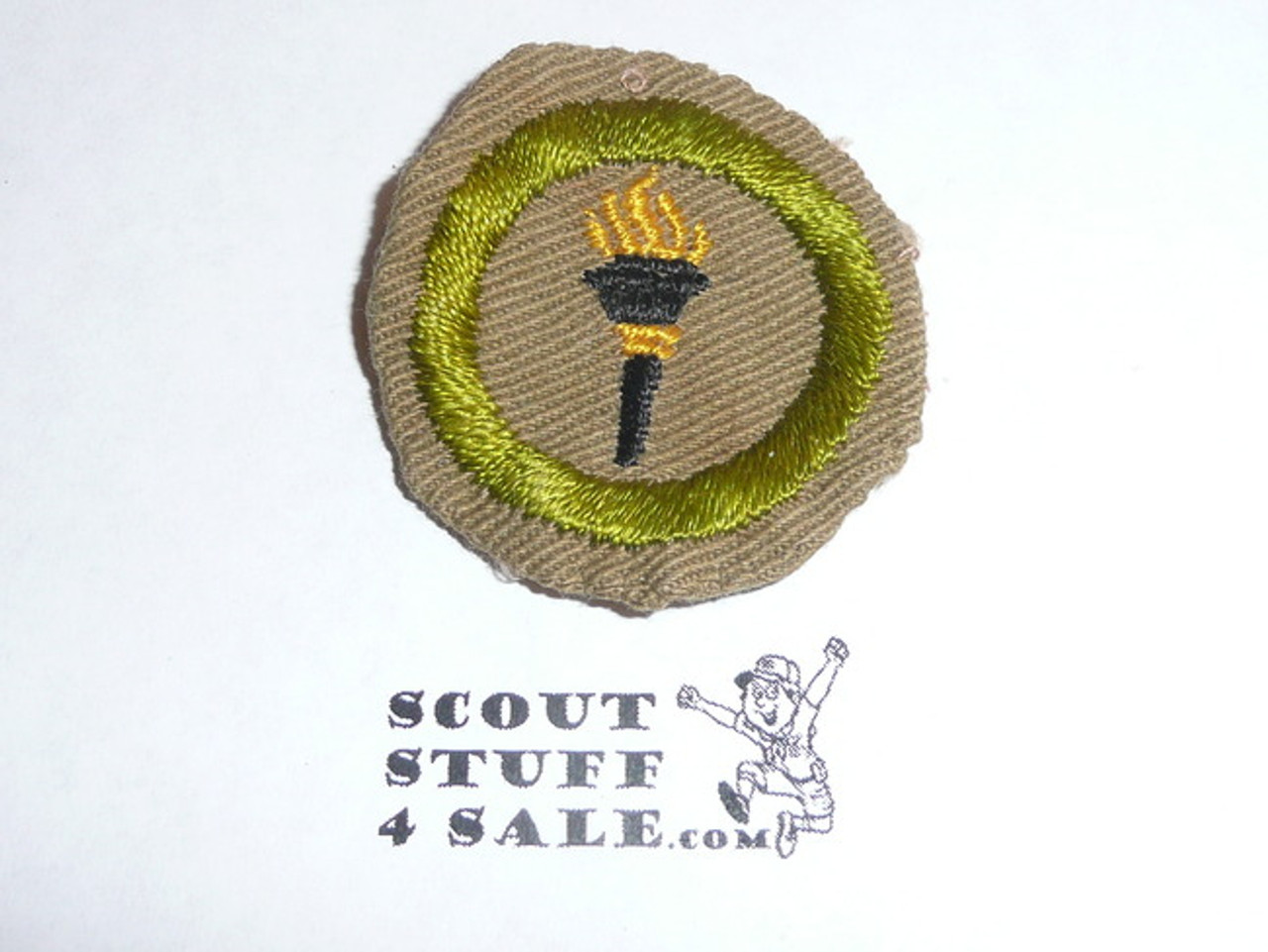 Public Health - Type A - Square Tan Merit Badge (1911-1933), Material folded under with some trimming