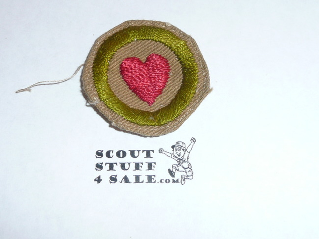 Personal Health - Type A - Square Tan Merit Badge (1911-1933), Material folded under with some trimming