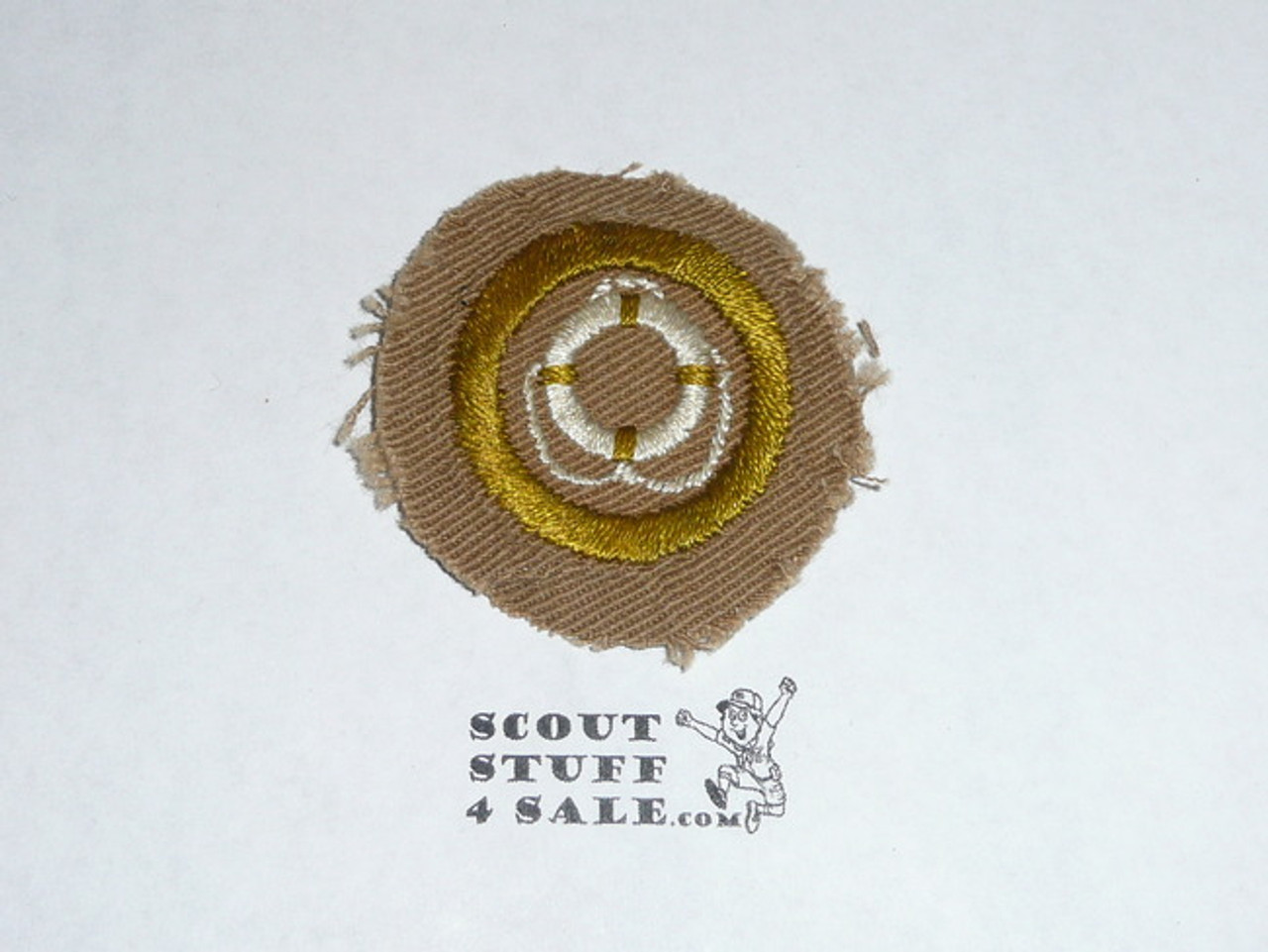 Lifesaving - Type A - Square Tan Merit Badge (1911-1933), Material trimmed and badge used