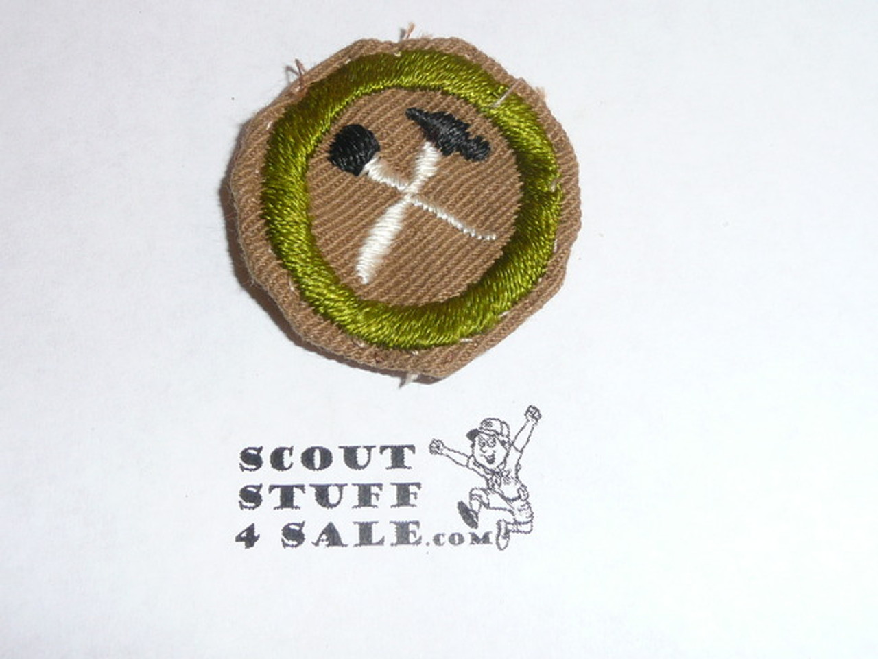 Handicraft - Type A - Square Tan Merit Badge (1911-1933), Material folded under with some trimming