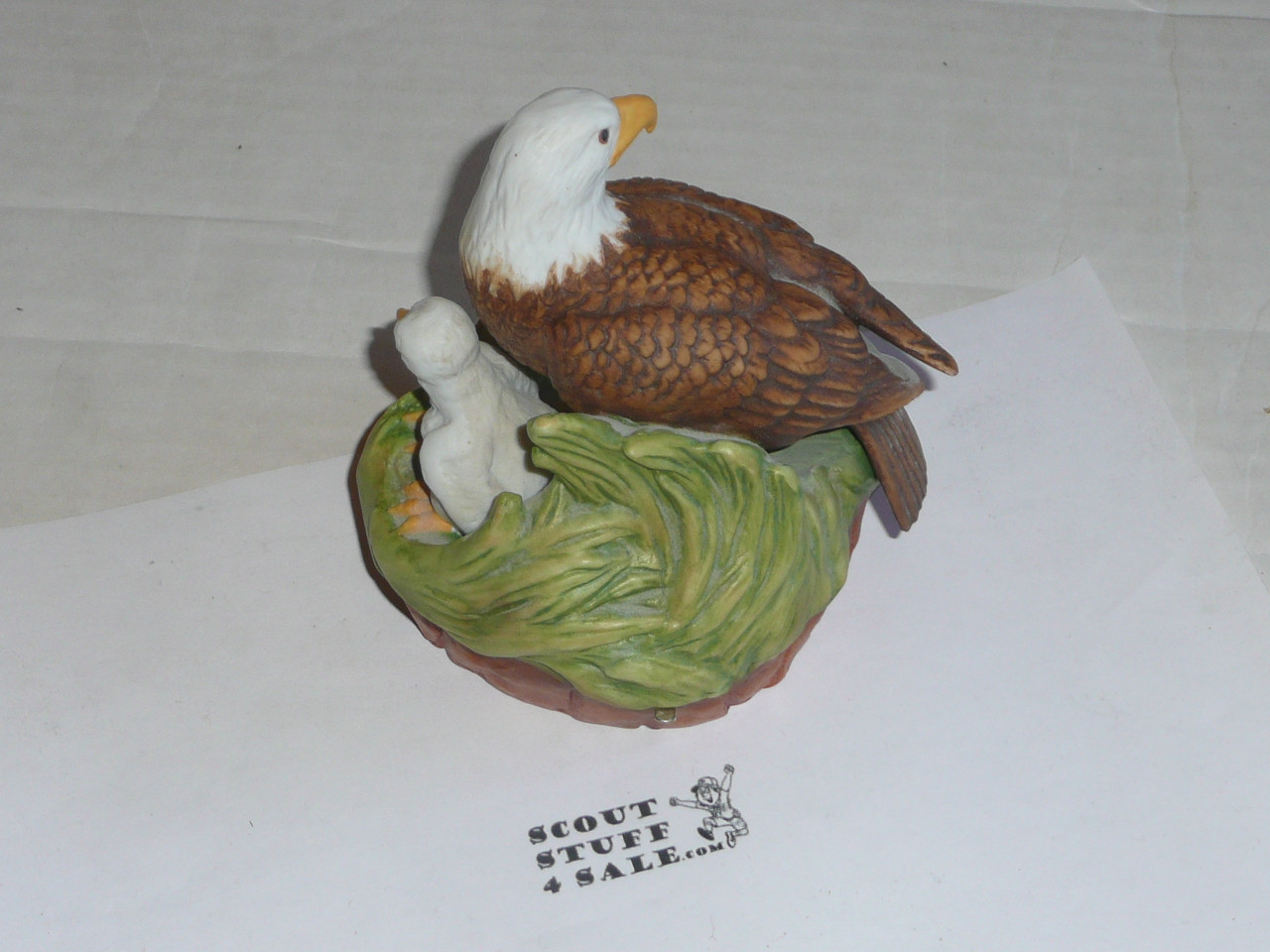 porcelin eagle musical statue, 5 tall by 4.5 wide