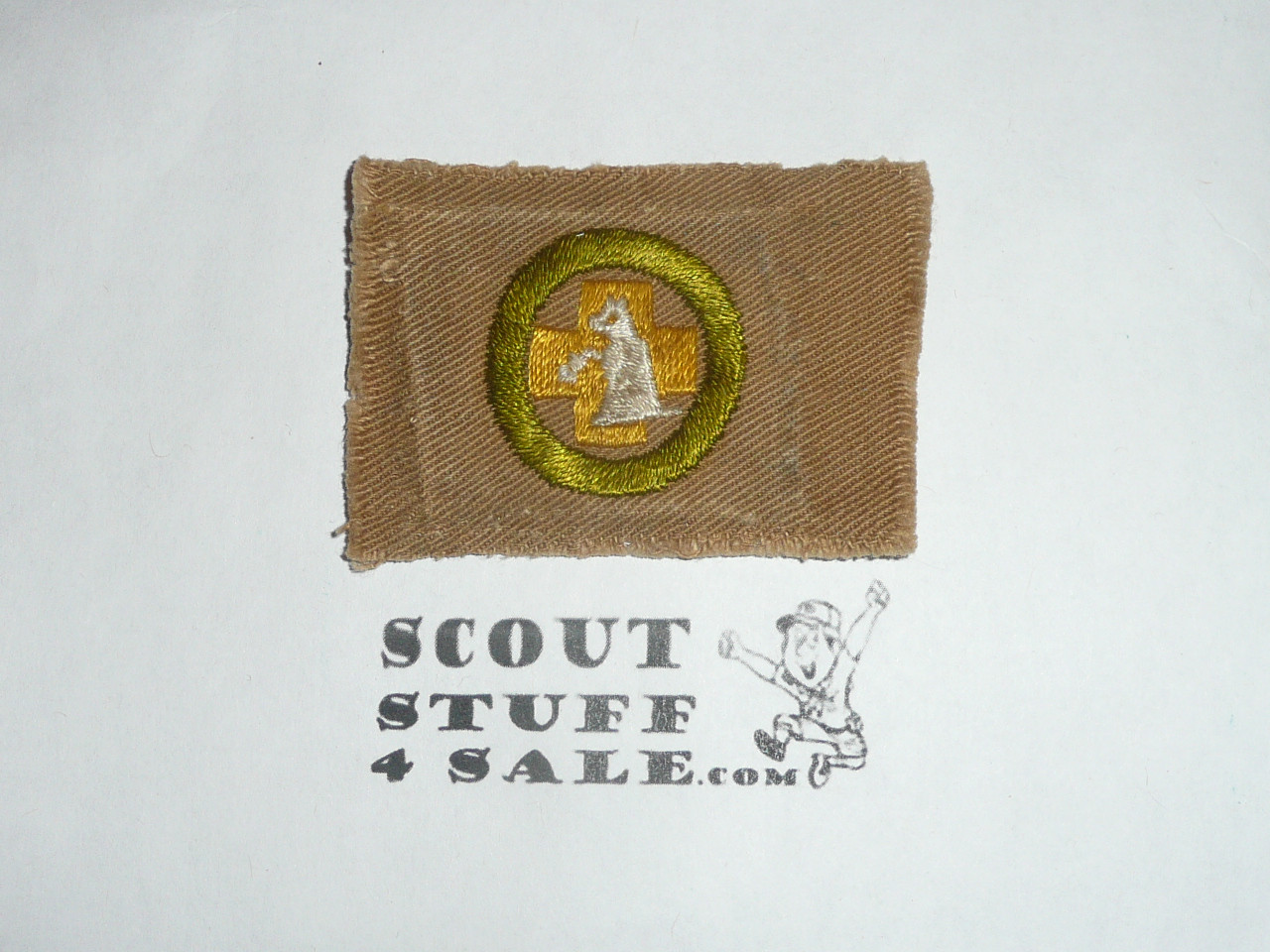 First Aid to Animals - Type A - Square Tan Merit Badge (1911-1933), used