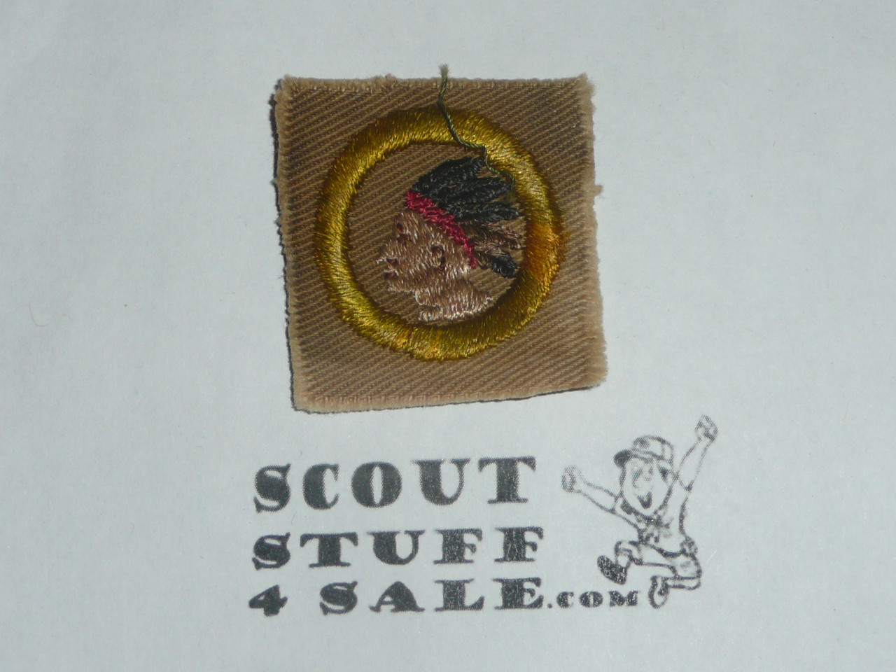 Pathfinding - Type A - Square Tan Merit Badge (1911-1933), discolored