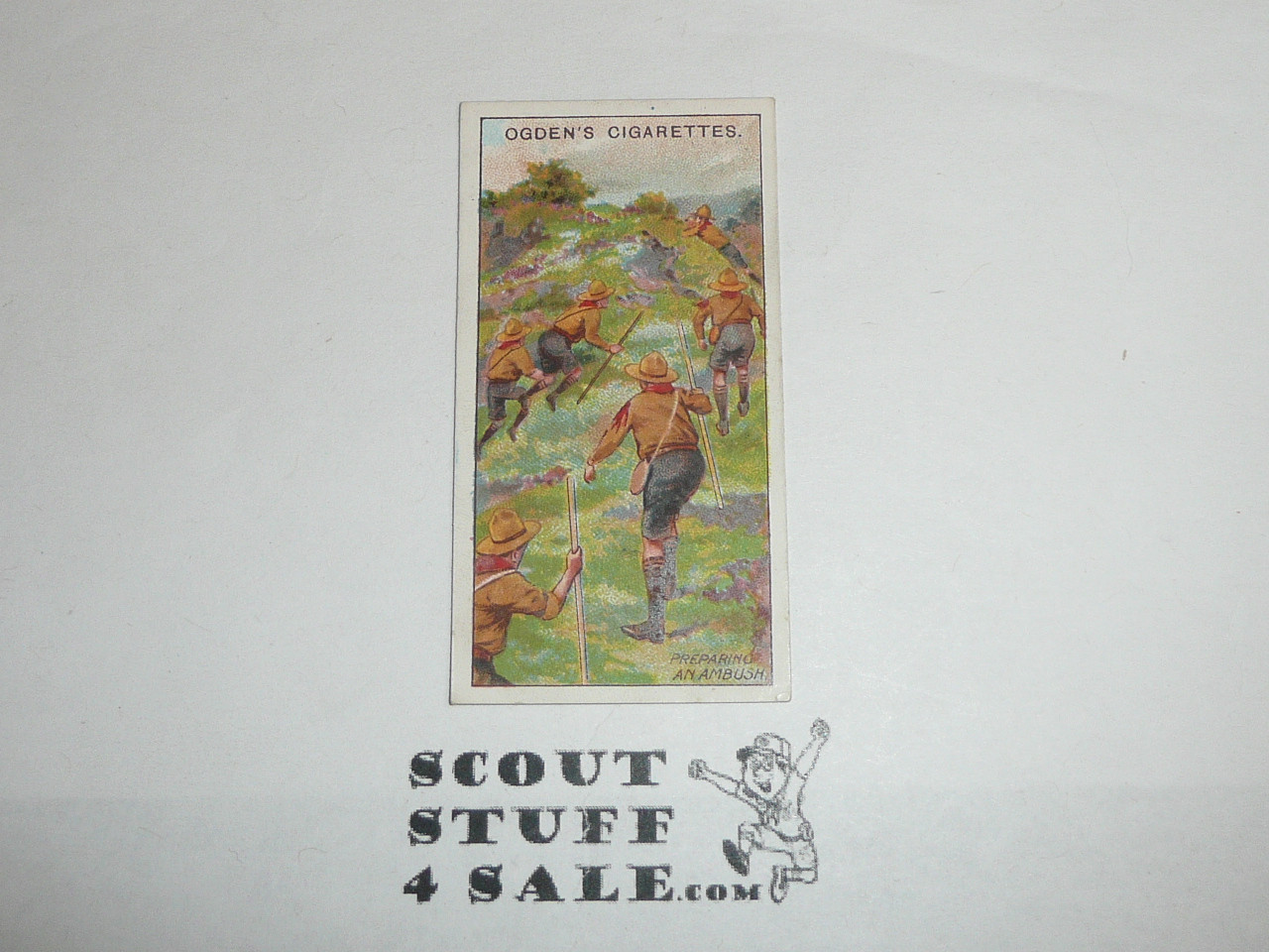 Ogden Tabacco Company Premium Card, First Boy Scout Series of 50 (Blue Backs), Card #31 Preparing an Ambush, 1911