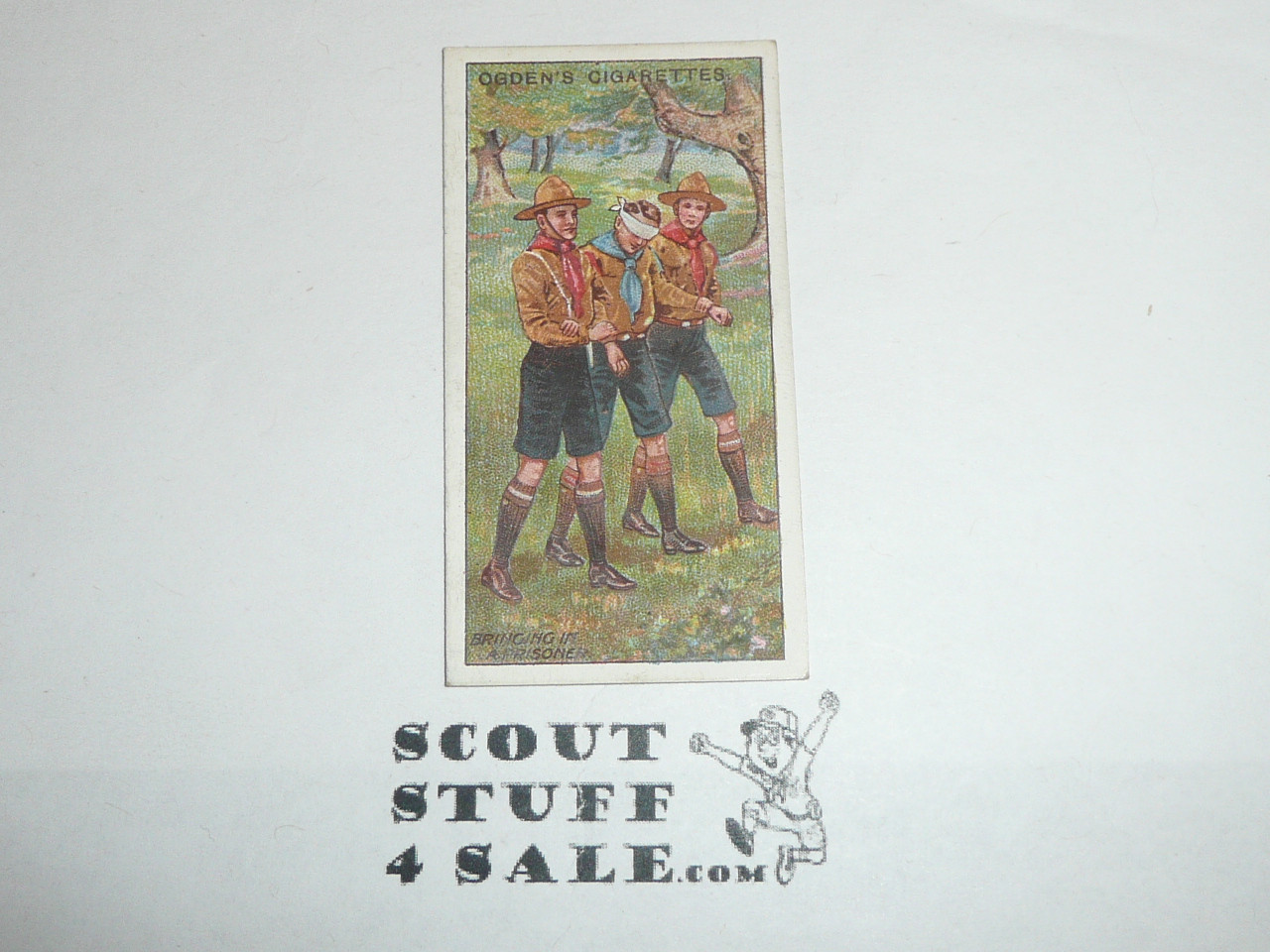 Ogden Tabacco Company Premium Card, First Boy Scout Series of 50 (Blue Backs), Card #33 Bringing a Prisoner Through the Camp Lines, 1911