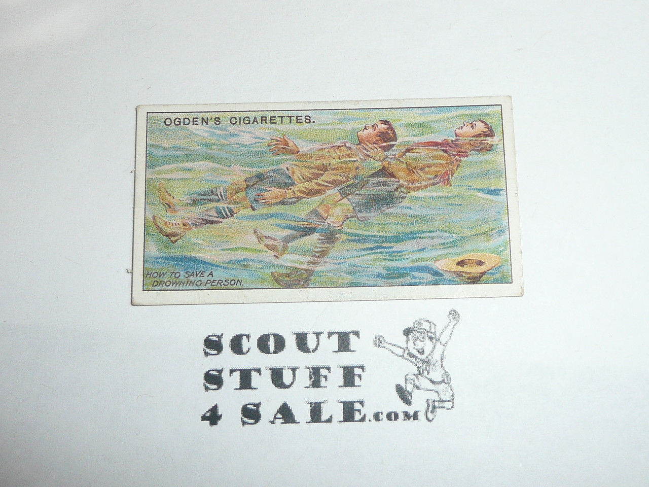 Ogden Tabacco Company Premium Card, Second Boy Scout Series of 50 (Blue Backs), Card #64 Life Saving, 1912