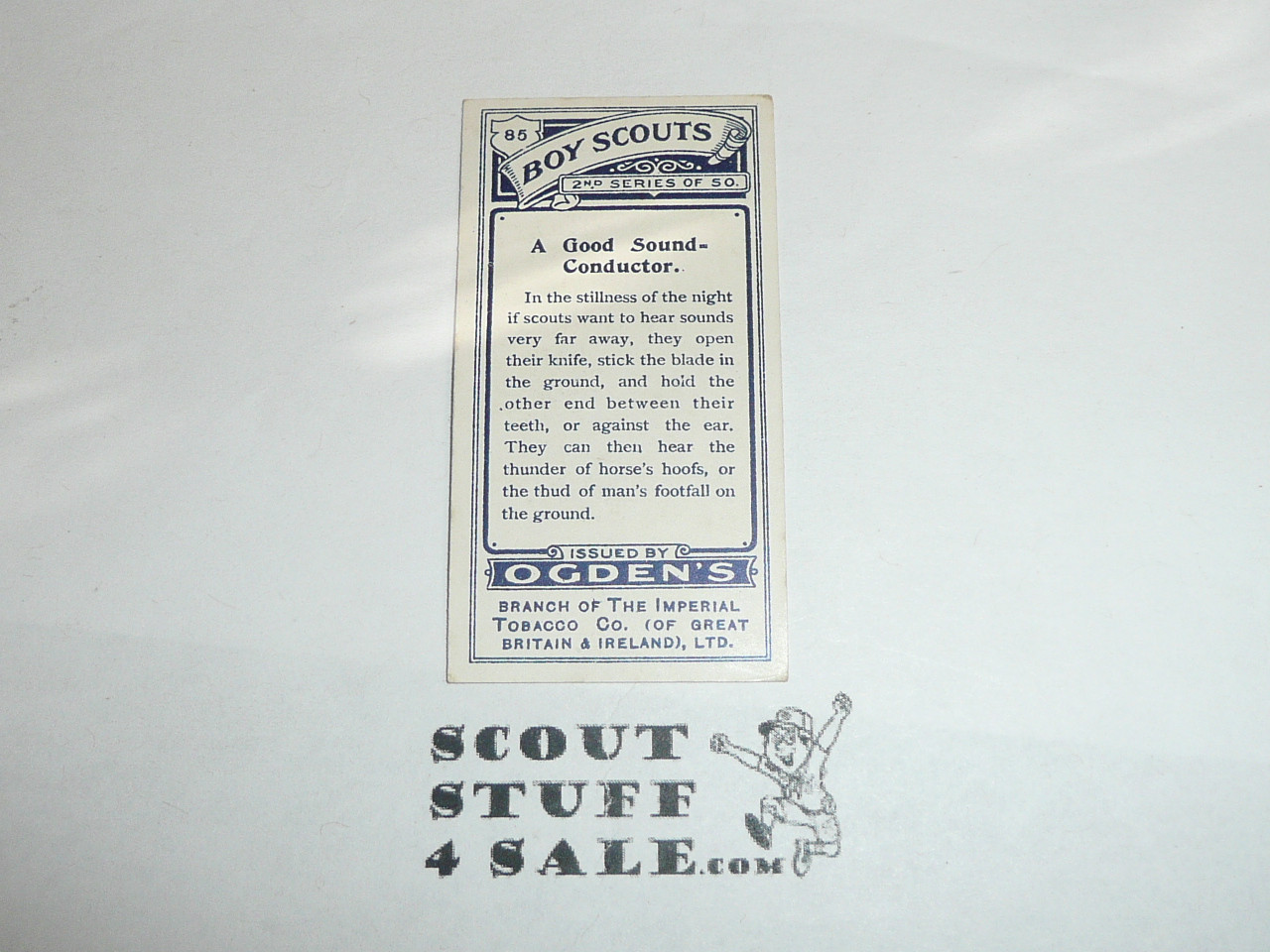 Ogden Tabacco Company Premium Card, Second Boy Scout Series of 50 (Blue Backs), Card #85 A Good Sound Conductor, 1912