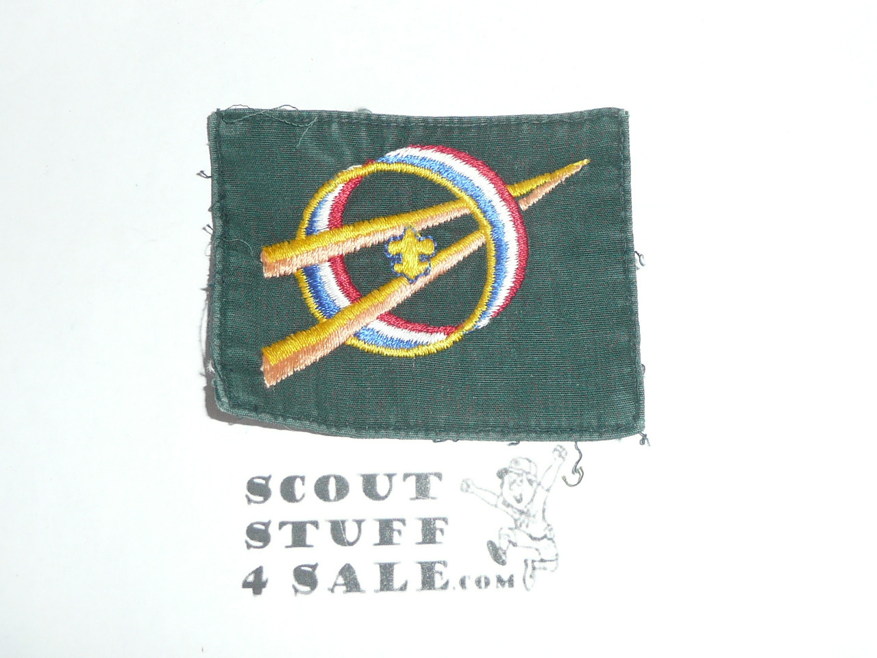 Explorer Scout Universal Emblem from the 1970's in Green with cut edge border, used