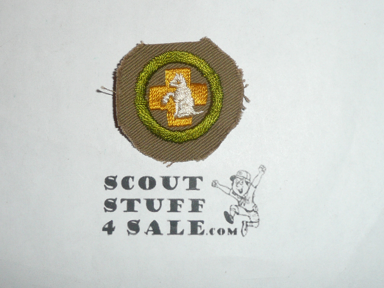 First Aid to Animals - Type A - Square Tan Merit Badge (1911-1933), Material trimmed not used