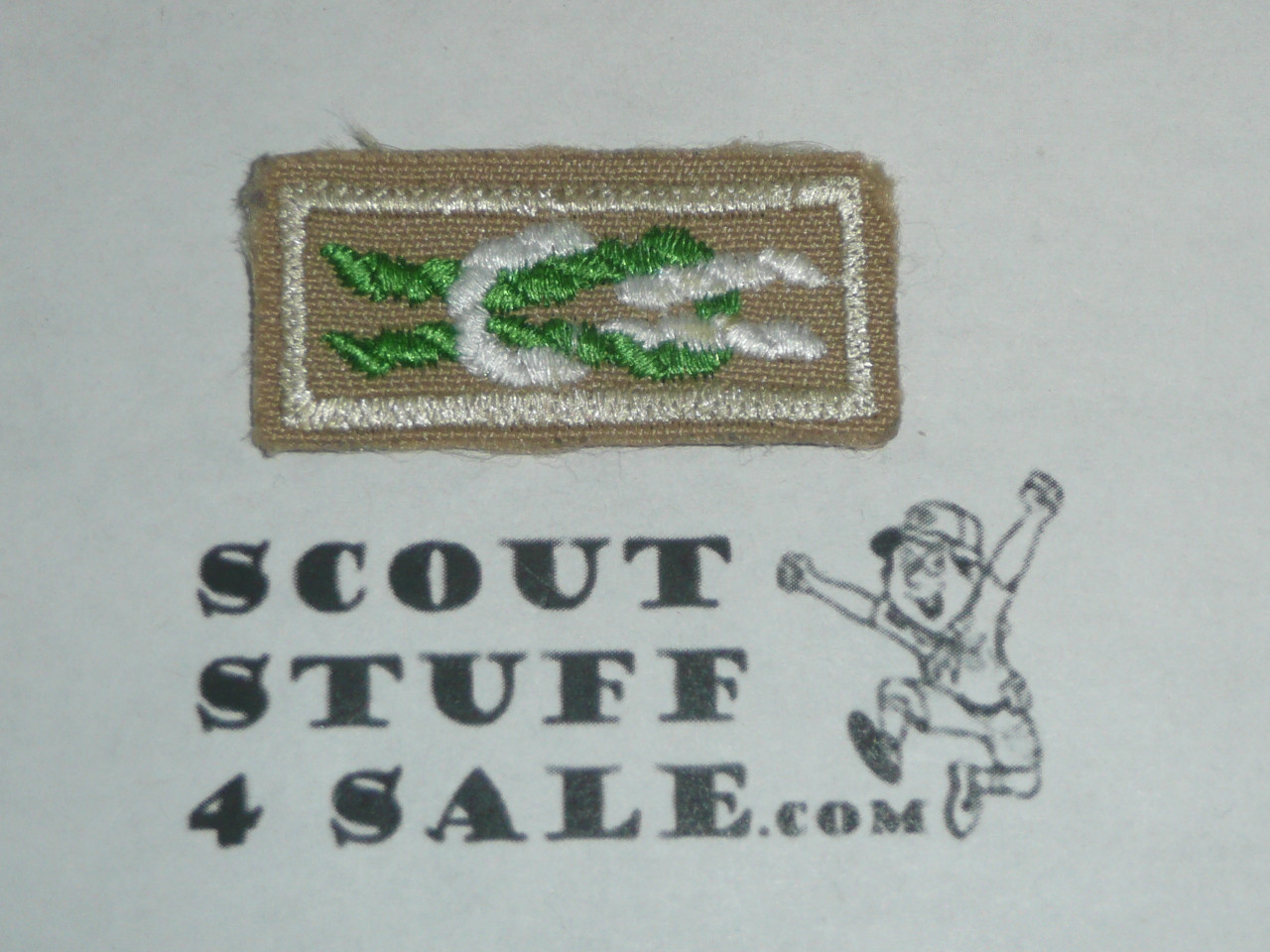 Scoutmaster's / Scouter's Key Award Knot on tan with Tan bdr, 1983-current, lite use