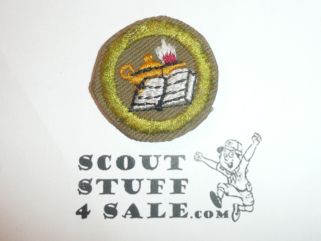 Reading - Type C -  Tan Crimped Merit Badge (1936-1946)