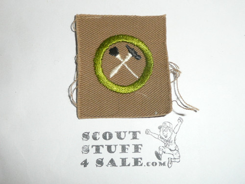 Handicraft / Home Repairs - Type A - Square Tan Merit Badge (1911-1933), black striped back