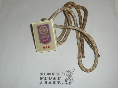 1971 World Jamboree Lucite Bolo Tie, dirty cord