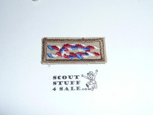 Eagle Scout Award Knot on tan with a khaki bdr, 1980's