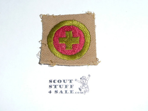 First Aid - Type A - Square Tan Merit Badge (1911-1933), used with material folded under