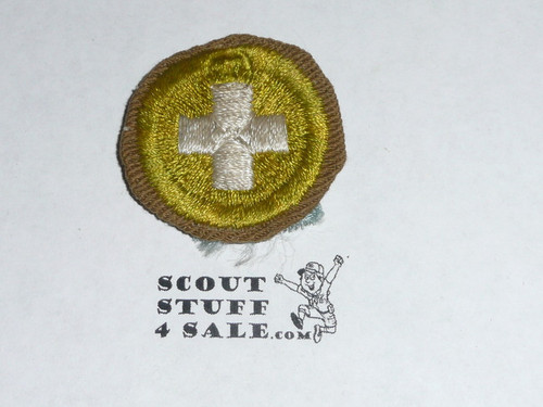 Safety - Type C -  Tan Crimped Merit Badge (1936-1946), used