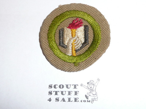 Scholarship - Type B - Wide Crimped Bdr Tan Merit Badge (1934-1935), was sewn but in very good condition