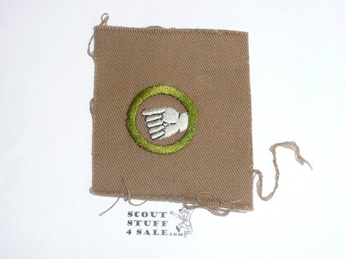 Physical Development - Type A - Square Tan Merit Badge (1911-1933), TEENS extended thumb, huge piece of cloth, black striped back