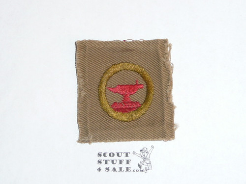 Blacksmithing - Type A - Square Tan Merit Badge (1911-1933), TEENS variety, black striped back, used