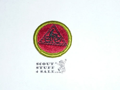 Cycling (Triangle with bike) (green bdr) - Type H - Fully Embroidered Plastic Back Merit Badge (1972-2002)