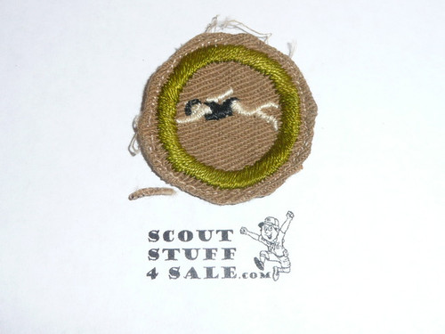 Swimming - Type A - Square Tan Merit Badge (1911-1933), Material folded under with some trimming