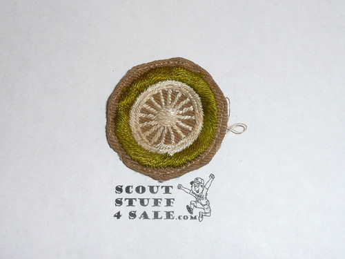 Cycling - Type A - Square Tan Merit Badge (1911-1933), Material folded under with some trimming