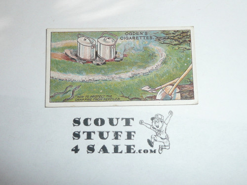 Ogden Tabacco Company Premium Card, Second Boy Scout Series of 50 (Blue Backs), Card #83 Keeping Reptiles Away from the Camp Fire, 1912