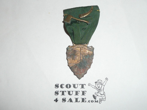 The Massacre Trail Medal with Axe and Powderhorn pins