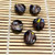 Faceted Glass Black Yellow Disk Beads (10-Pack) | 14mm Wave