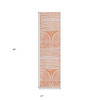 2' X 8' Orange and Ivory Abstract Washable Non Skid Indoor Outdoor Area Rug