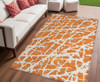 5' X 8' Orange and White Abstract Washable Non Skid Indoor Outdoor Area Rug
