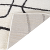 8' X 10' Ivory And Black Abstract Area Rug