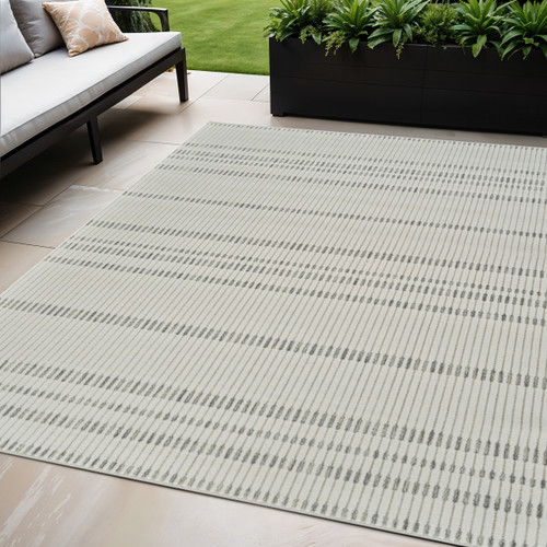 5' X 7' Cream and Beige Striped Distressed Indoor Outdoor Area Rug 5' X 7' Cream and Beige Striped Distressed Indoor Outdoor Area Rug