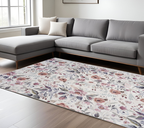 9' X 12' Ivory Pink And Green Floral Distressed Washable Area Rug