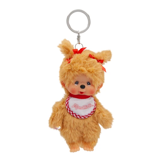 Monchhichi Beige Beanie Girl Plush toy with brown fur, sweet face, thumb in mouth, wearing beige knit beanie hat at Jellybeet