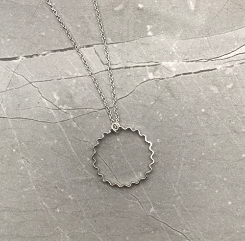 Silver Ripple Pendant Necklace by Iona Hall