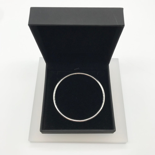Small Notches Bangle in Silver by Iona Hall
