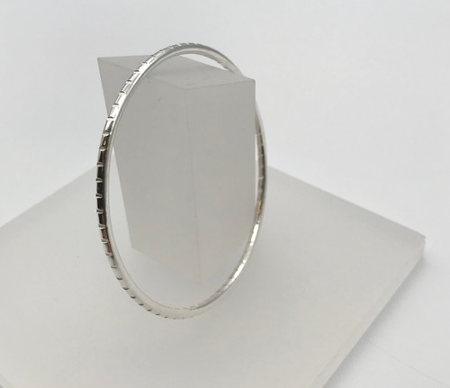 Large Notches Bangle in Silver by Iona Hall