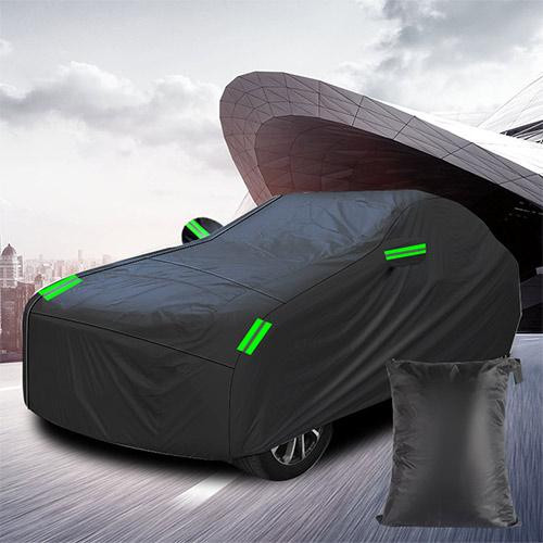 CRAFTEK CAR COVER CRAFTEK GUD-BY-1026M Waterproof Black Medium for Car 165 to 177 inches long, covering a car parked outdoors with a city skyline in the background.