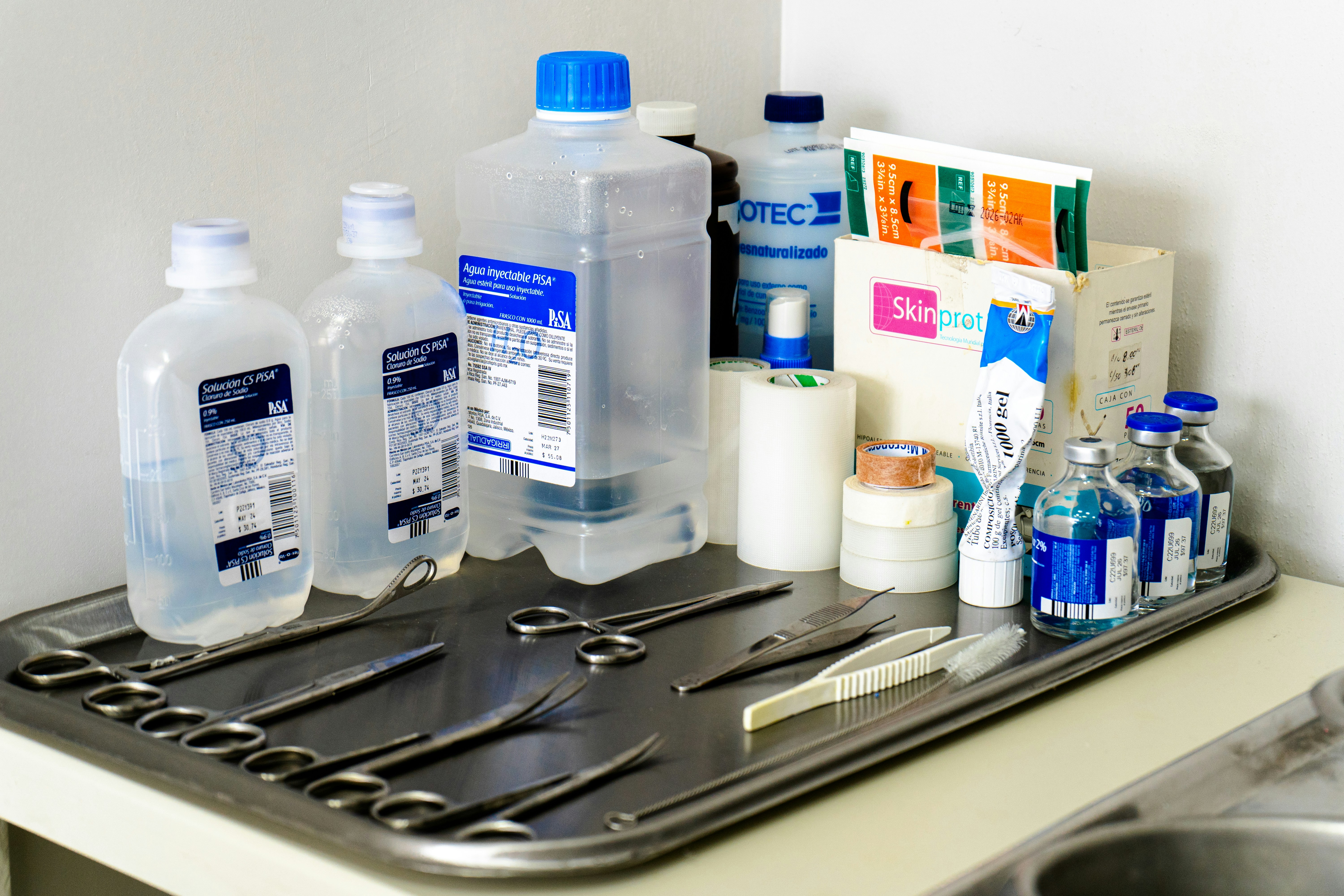 Medical supplies and instruments on a tray