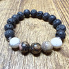 MiaLava Guardian Angel aromatherapy diffuser bracelet with lava stone, pink rhodonite, and howlite beads