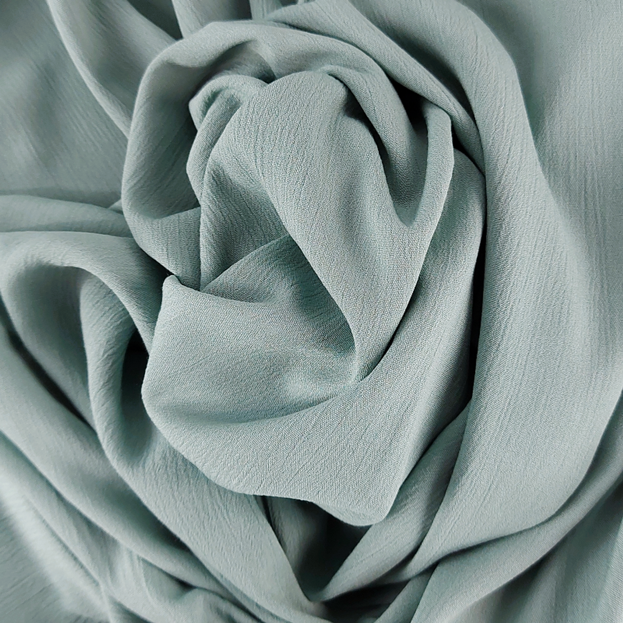 A beautiful Borken Crepe fabric for ladies apparel wear.