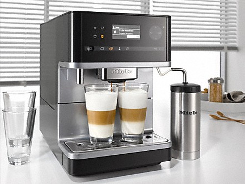 Miele CM6310 - Black: Cafe-quality espresso, coffee, cappuccinos or lattes are yours when you want them with the Miele CM6 espresso maker. Like a good barista, this machine remembers all your favorite coffee drinks exactly, thanks to programmable settings for up to four users. The CM6 is also designed for virtually effortless maintenance.
Intuitive DirectSensor user interface matches Miele GEN6000 built-in appliances.
Four user profiles allow you to set preferences for temperature, amount of coffee/water and fineness of grind.
OneTouch for Two prepares two coffee drinks simultaneously with one touch of a button.
Height-adjustable central spout (3" to 5 1/2") fits taller glasses.
Built-in conical grinder with five settings.