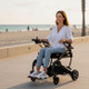 Lifestyle Shot of Pride Jazzy Carbon Swift Folding Electric Wheelchair