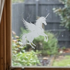 Close-up of a right-facing frosted  Misty Moon - Unicorn window cling clinging to glass, showing etched-glass texture and soft matte finish.