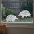 Two frosted Echidna window clings displayed on a window, showing left and right-facing designs with etched-glass texture and soft matte finish.