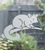 Close-up of a right-facing frosted  Brushtail Possum window cling clinging to glass, showing etched-glass texture and soft matte finish.